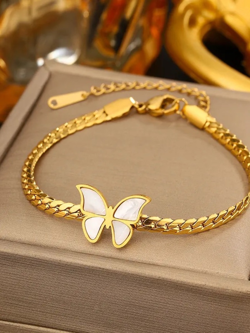 Gold Butterfly Bracelet with White Inlay Charm